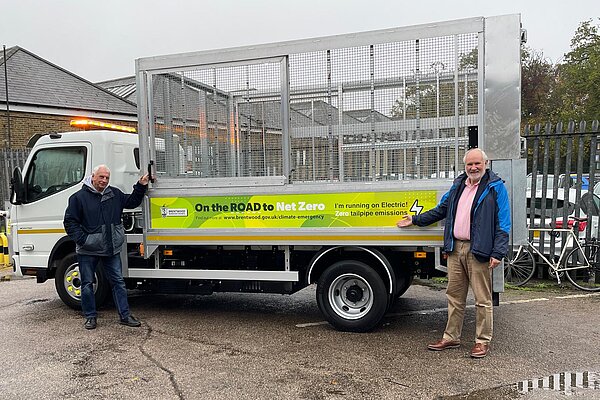Councillors Aspinell and Worsfold with new EV truck for waste collection