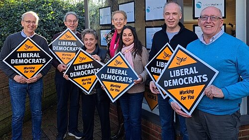 Lib Dem team outside local party HQ